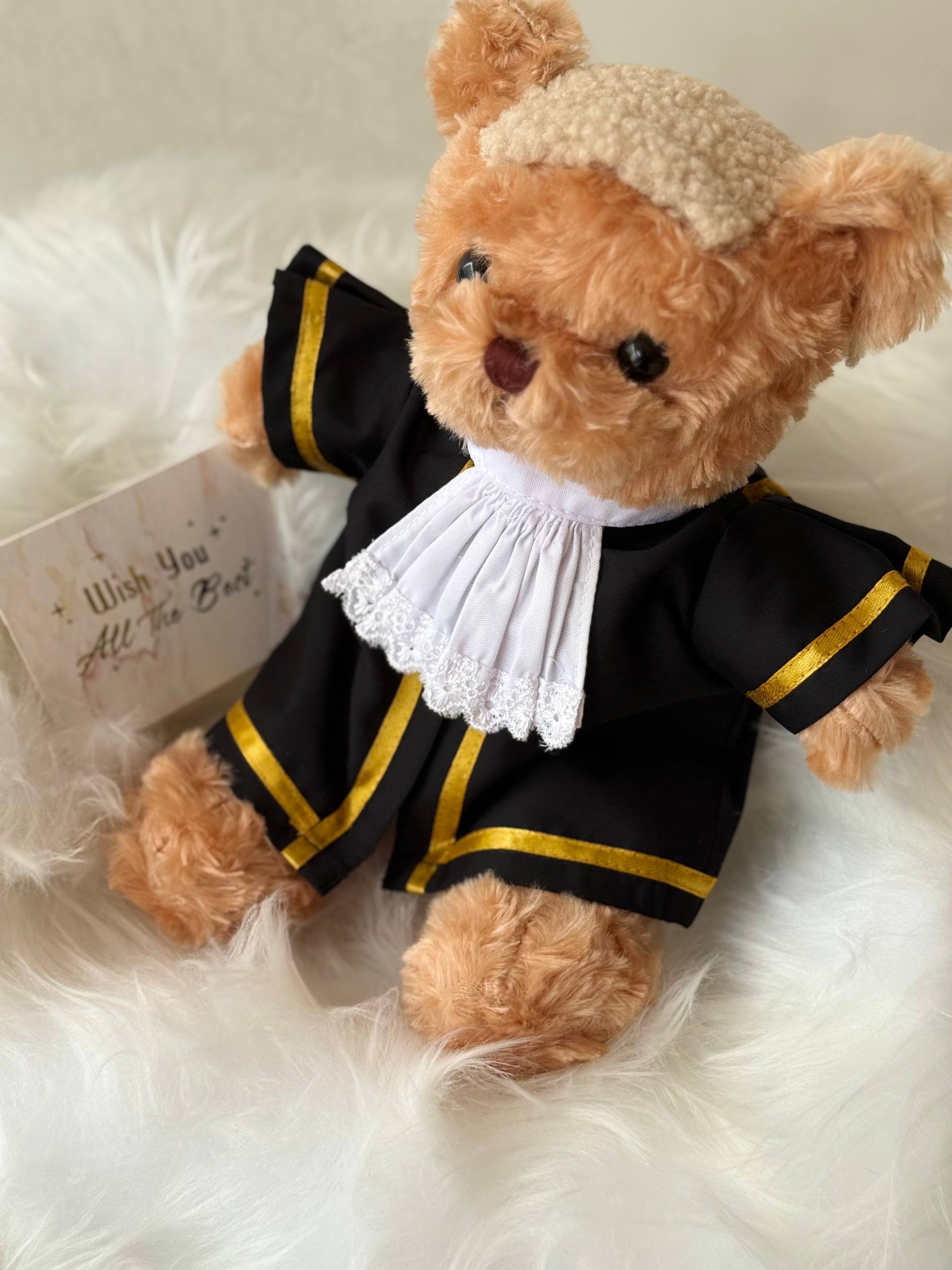 Judge Bear — A handcrafted teddy bear dressed in a distinguished judge's robe, complete with an optional authentic judge's wig. A prestigious and meaningful gift for judges and legal professionals.