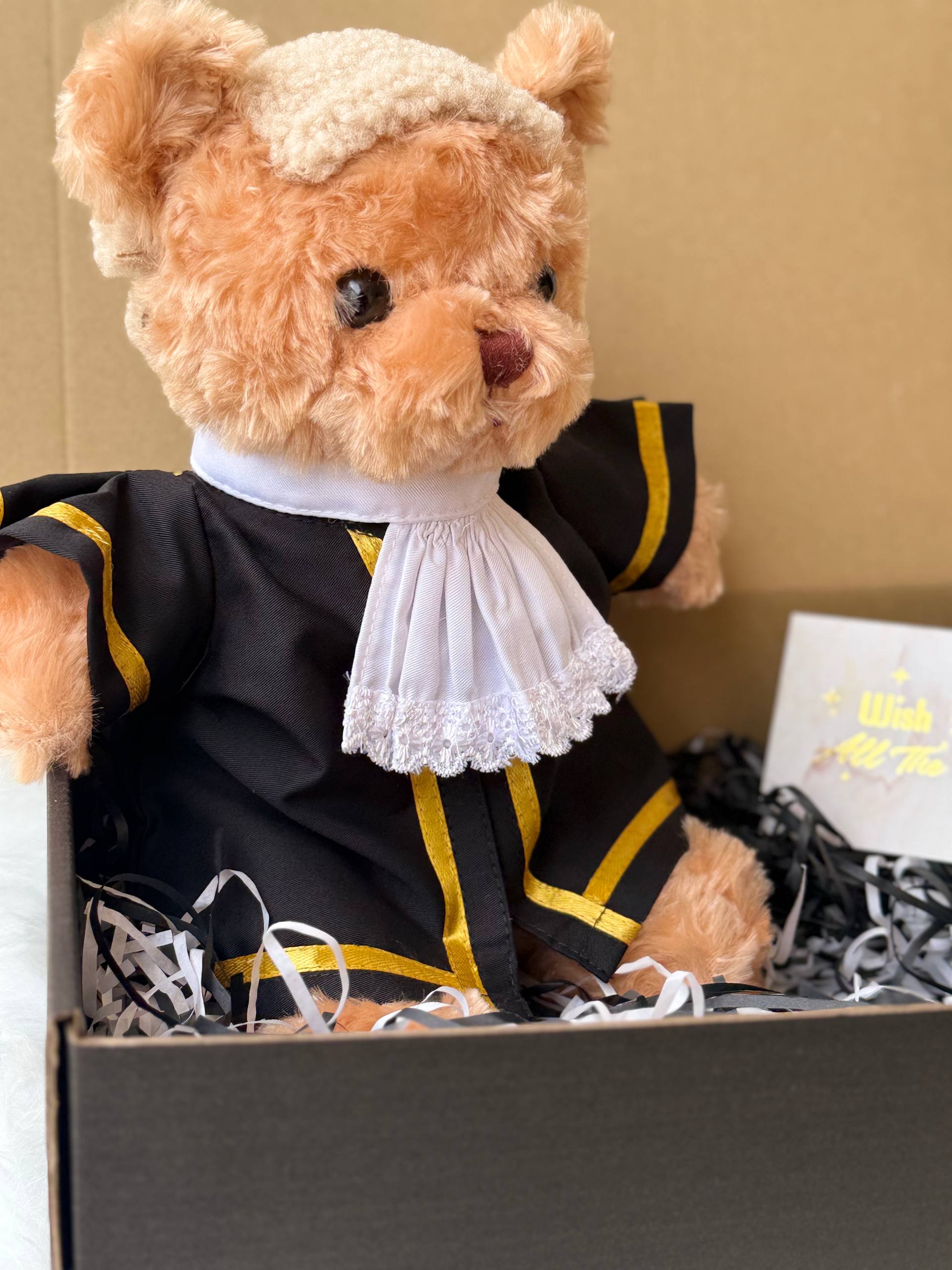 Judge Bear — A handcrafted teddy bear dressed in a distinguished judge's robe, complete with an optional authentic judge's wig. A prestigious and meaningful gift for judges and legal professionals.